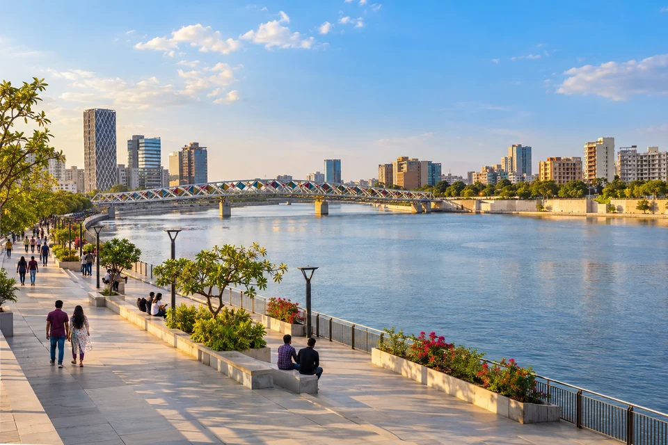 Illustration: Illustrative city view of Sabarmati Riverfront with promenade and contemporary city skyline