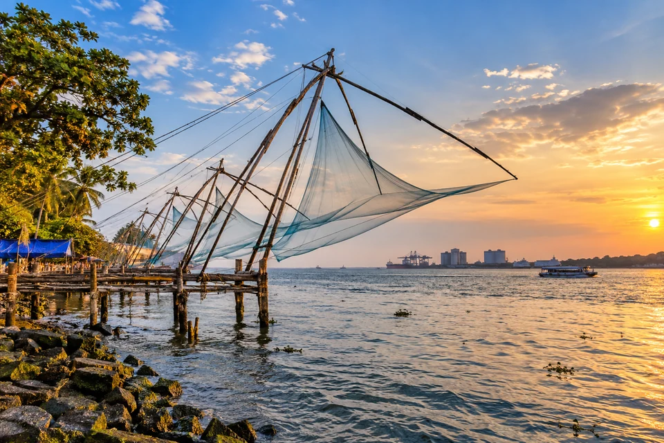 Illustration: Illustrative city view of Fort Kochi waterfront and traditional Chinese fishing nets